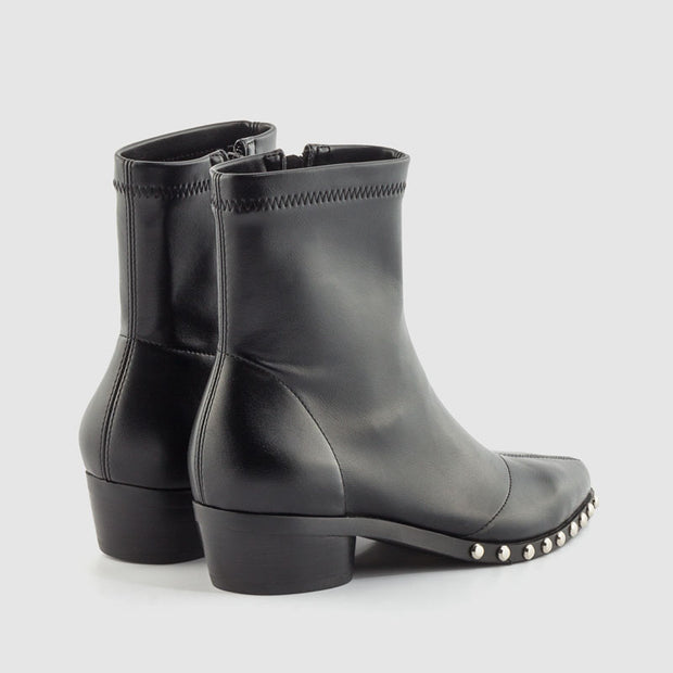 BOTIN ELASTICO TACHAS PISO NEGRO